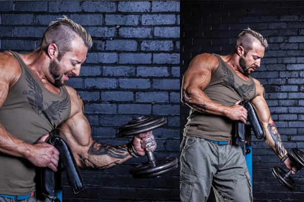 Kris Gethin performing a preacher hammer curl