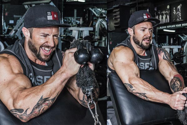 Kris Gethin performing a preacher rope curl